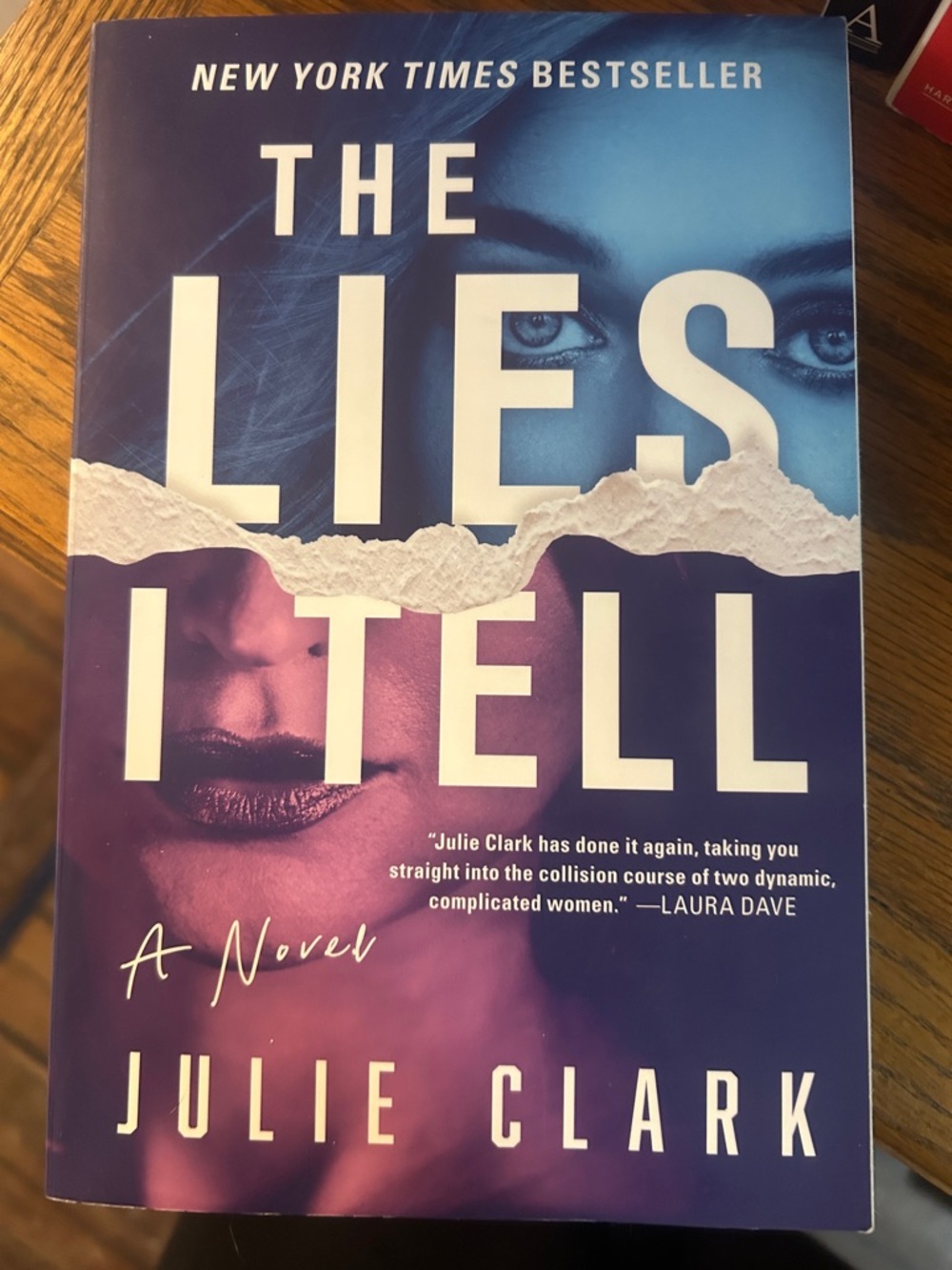The Lies I Tell by Julie Clark - Blue & Purple Paperback Novel